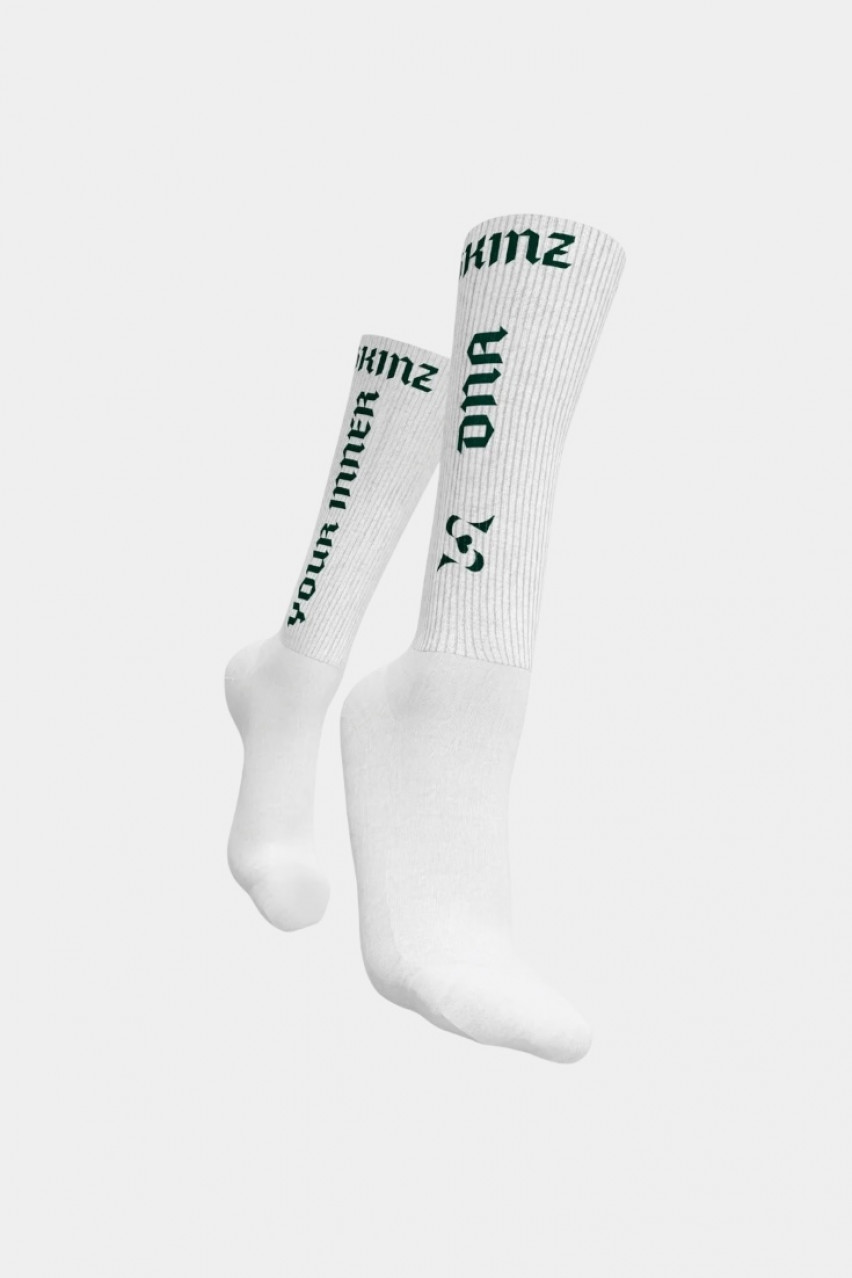 Білі шкарпетки Stacks із зеленими надписами SKINZ
